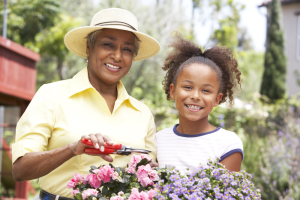 conversations diverse fam Grandmother With Granddaughter Gardening Together